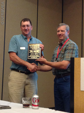 President David Gillman (UT) presents Past President Will Walter, left, with his retiring officer plaque