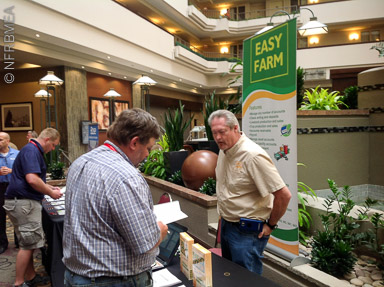 Visitors to the Easy Farm booth
