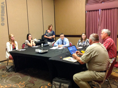 FBM instructors Ira Beckman and Wayne Pike (MN) describing their jobs to the CHS Scholarship recipients.