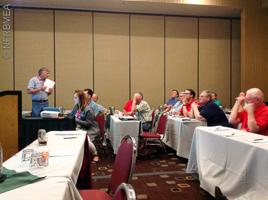 Treasurer Myron Oftedahl reporting during the Annual Meeting