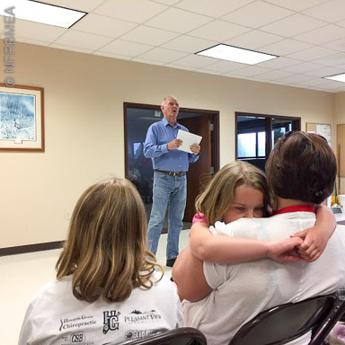 Harry Stine talking to tour group.